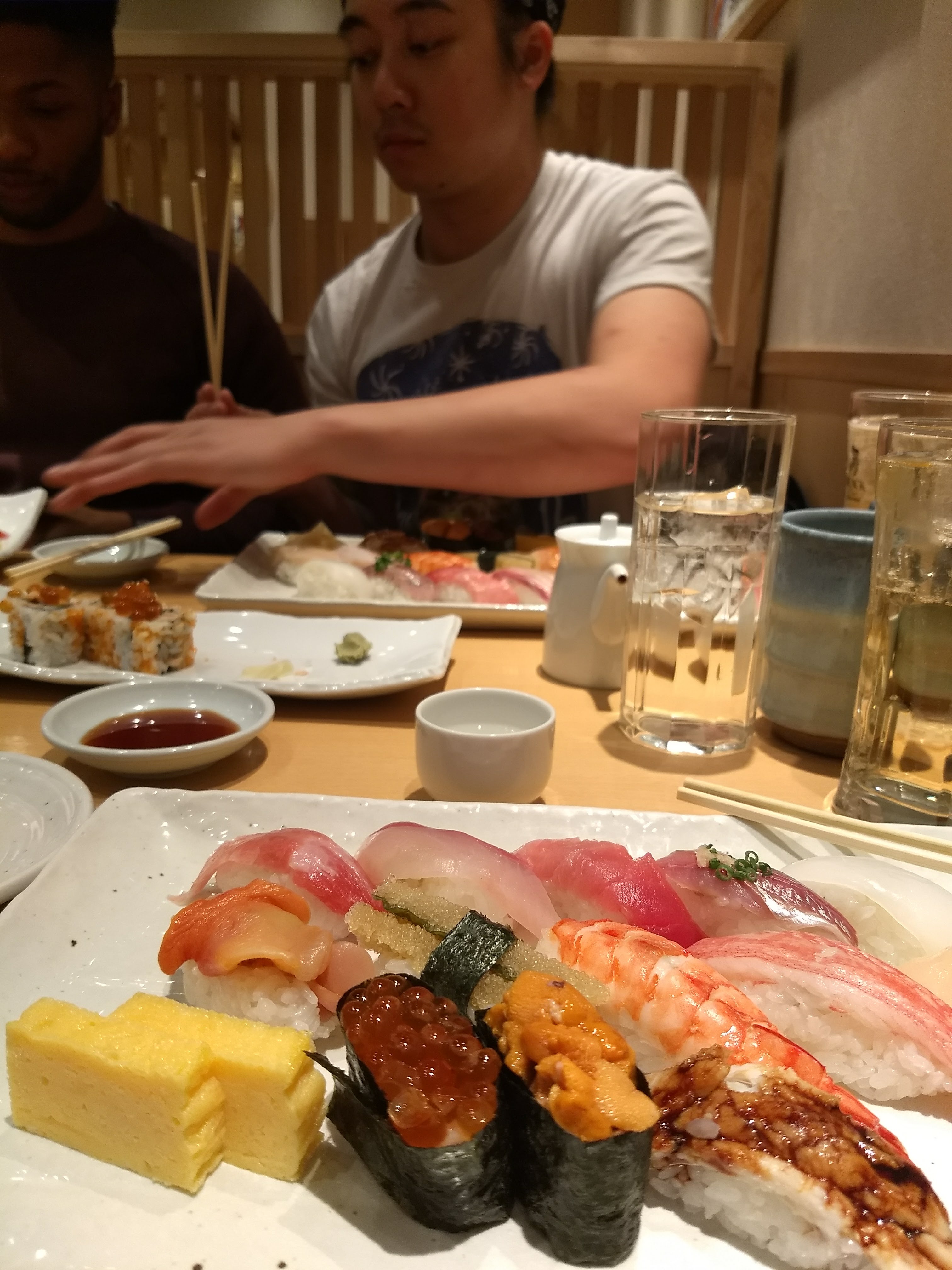 A plate of assorted nigiri sushi — uni, ikura, tamago, shrimp and eel — served at Hotel Sunshine in Kinugawa.